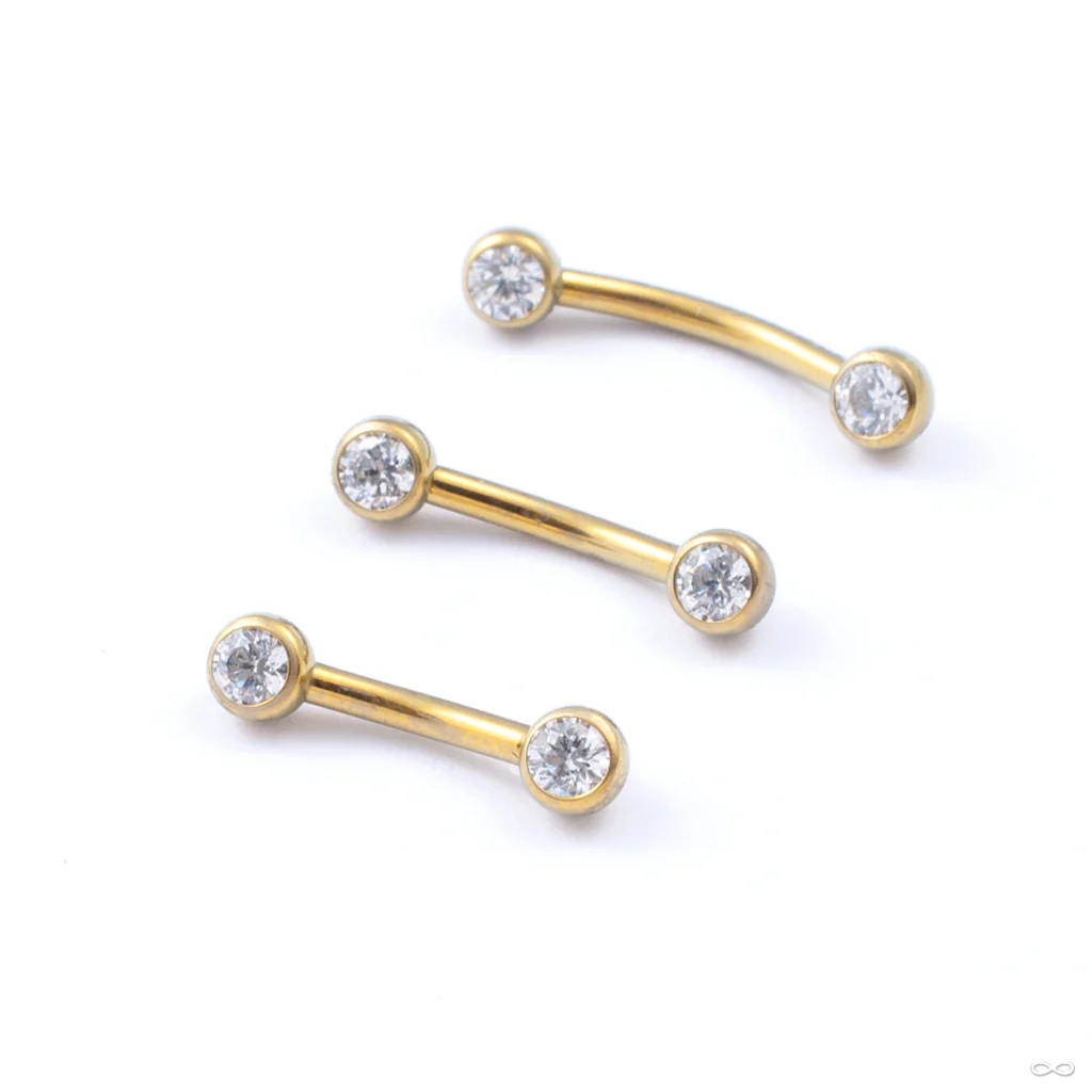 Curved Press-fit Post with Side-set Stones in Titanium Anodized Gold from Neometal - Image 2