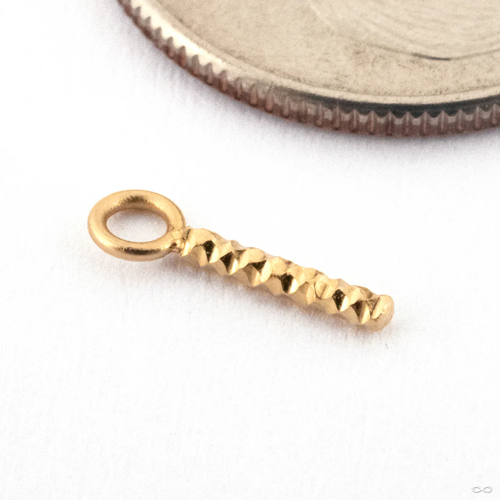 Shimmer Charm in Gold from Quetzalli - Image 2