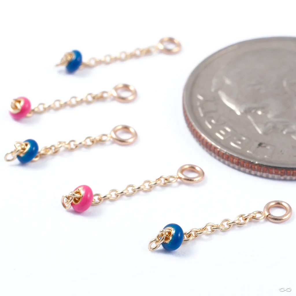 Vibrant Charm in Gold from Pupil Hall