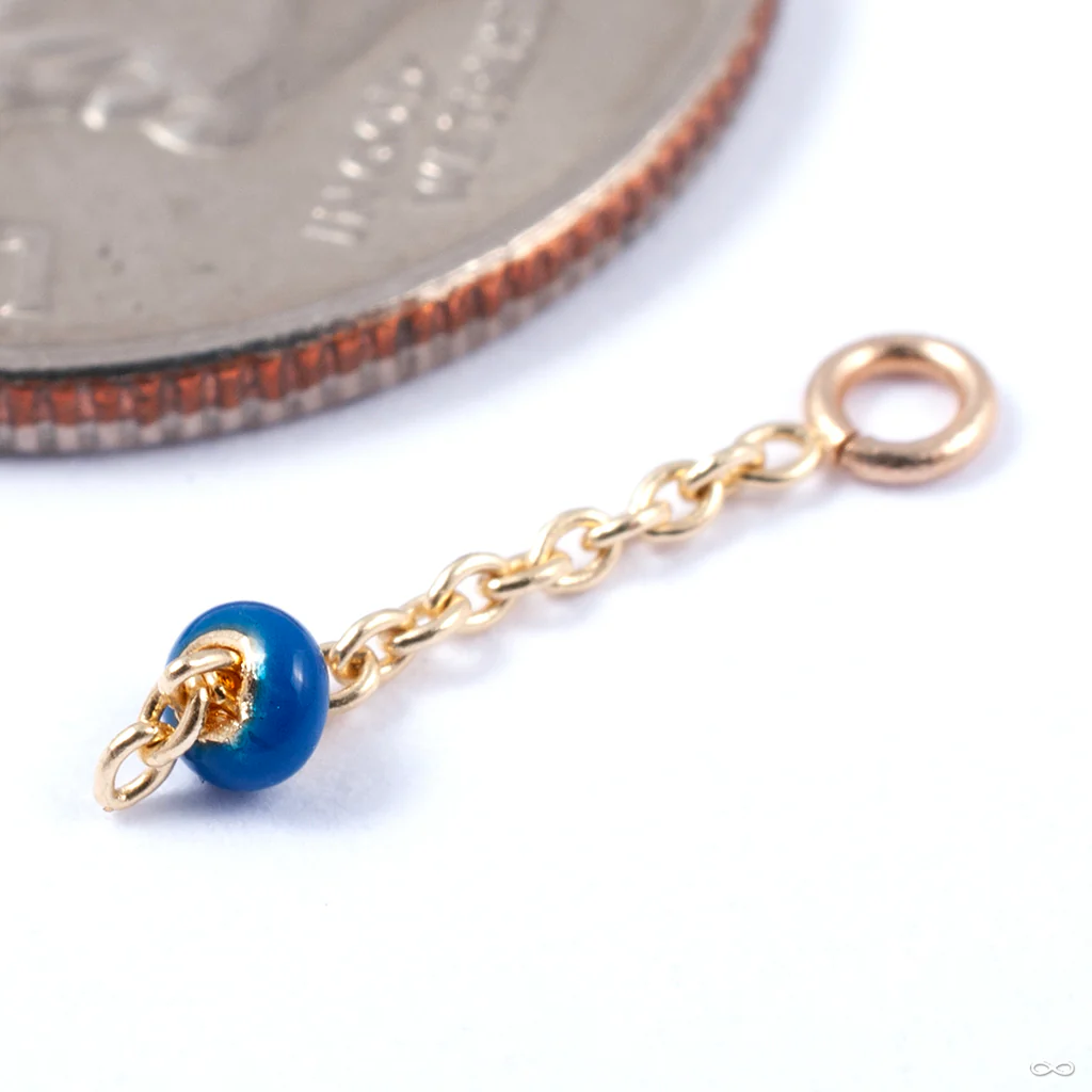 Vibrant Charm in Gold from Pupil Hall - Image 3