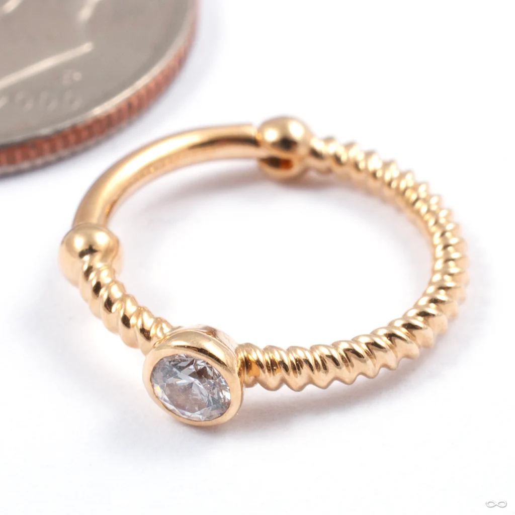 Vyunok Clicker in Gold from Auris Jewellery