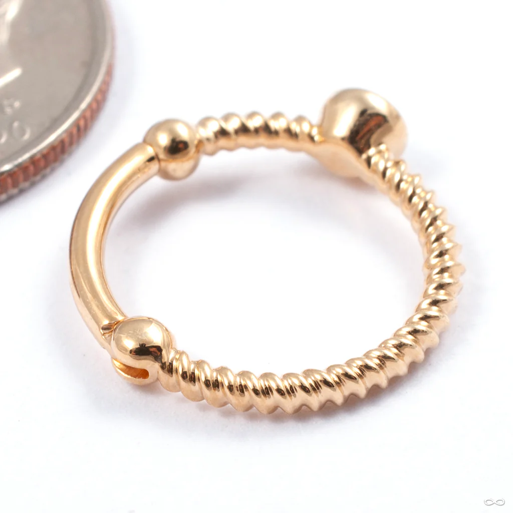 Vyunok Clicker in Gold from Auris Jewellery - Image 2